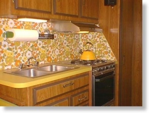 I think this is my aunt's kitchen.  The pattern paper is probably contact paper. 