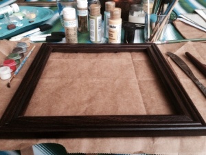 I picked up Martha Stewart gold metallic paint and started by multiple layers of thin gold paint.  