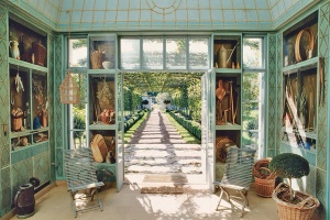 French artist Fernand Renard painted trompe l’oeil scenes on the storage cabinets that line a room at the Mellons’ greenhouse complex in Virginia. One cabinet door includes an image of a ring hung on a ribbon. Once the door was opened, there was a hook with a ribbon, onto which Bunny Mellon safely threaded her wedding band before gardening. 